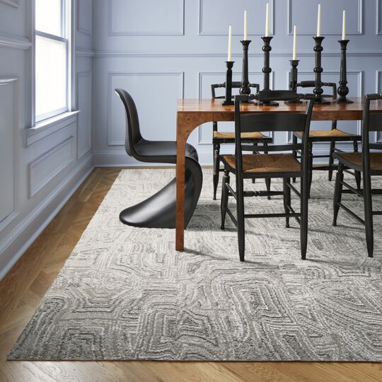 Dining area with FLOR Anthracite area rug shown in Chalk/Silver